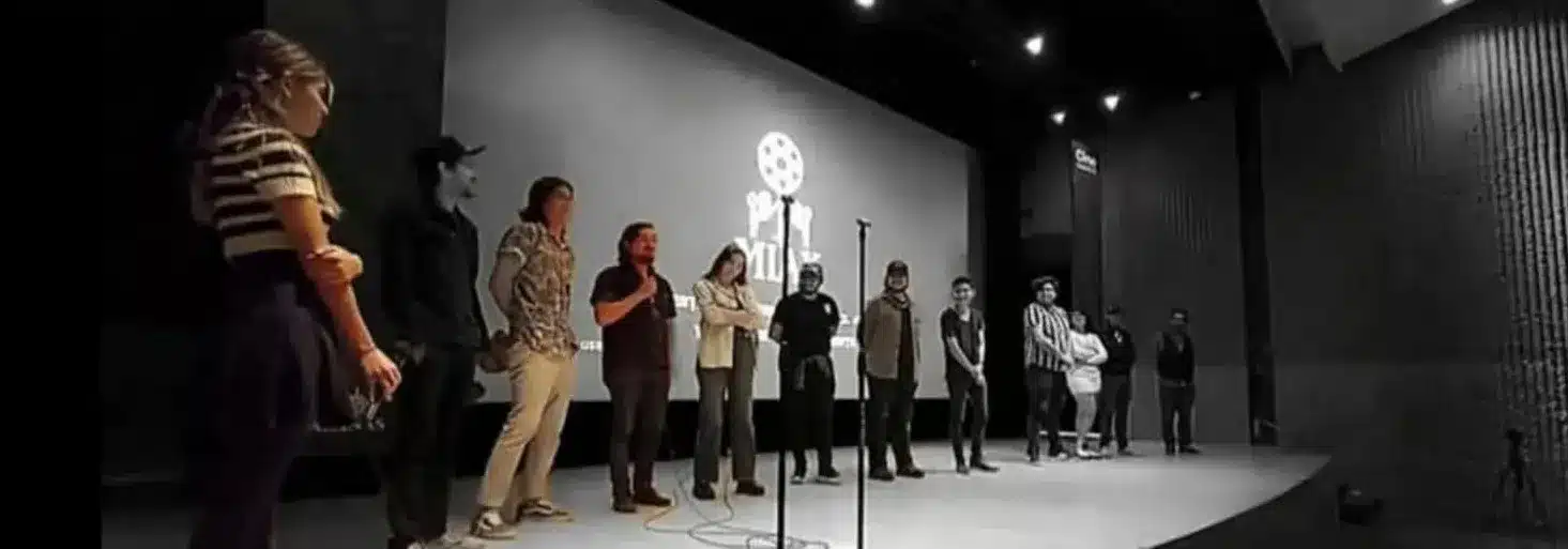 MIAX 1 a group of people standing on a stage